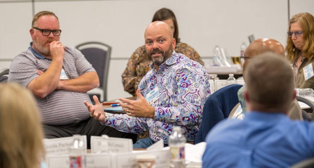 Super Dave Quinn talking to other economic developers at the Advanced Economic Development Leadership (AEDL) executive education Workshop in Fort Worth Texas. 